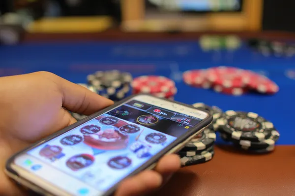 A confident dealer surrounded by casino chips inviting players to access their OLYMP account, reflecting quick and easy login options.